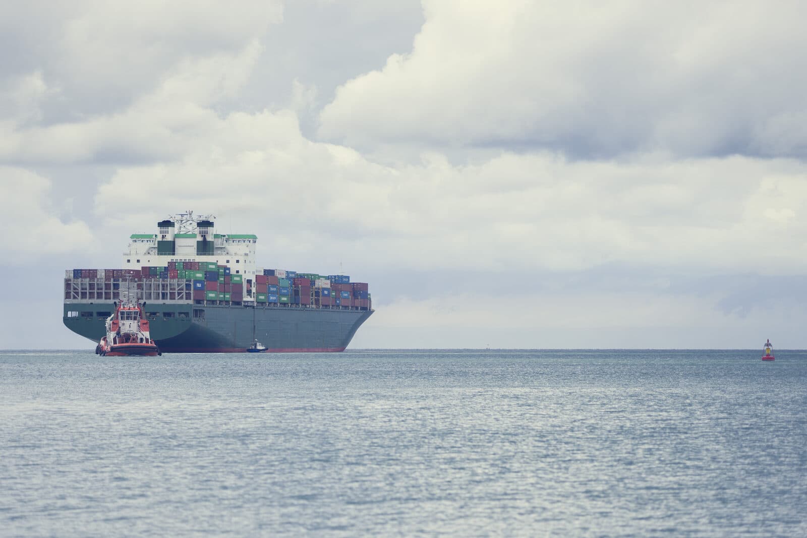 Container ship carrying freight across the open sea